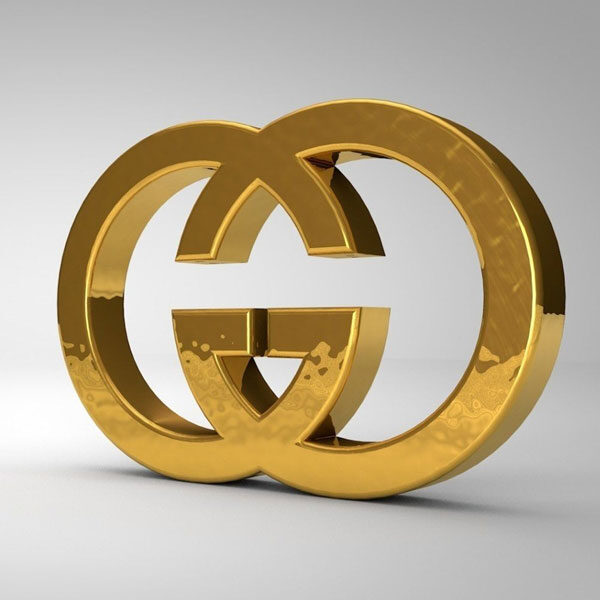 Isotipo de Gucci dorado tridimensional tomado como referencia para el moodboard